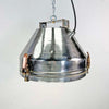 industrial ceiling light in aluminium with a cage covering the glass lens. Reclaimed and restored for modern interiors, This was originally manufactured by VEB Leuchtenbau Wittenberg and restored by Loomlight Design in UK