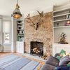 vintage industrial large aluminium ceiling light in a modern rustic living room