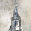 This large industrial light is a striking example of authentic explosion proof lighting, originally designed for hazardous environments and now meticulously restored for modern interiors. Crafted from heavy-duty aluminium, this ATEX ceiling light has been salvaged and professionally refurbished to exceed British safety standards, making it both a functional and statement piece.