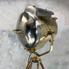 A tall nautical brass and steel searchlight mounted onto a British antique wooden surveyors tripod. A unique and original tall tripod floor lamp perfect for creating the "wow" factor with a nautical style fixture.