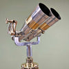 Shop for a refurbished set of antique binoculars paired with a German tripod with brass fittings and hard wood construction. Nikko 15x80 WWII military binoculars originally used for land, sea and air observation.