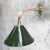 industrial style green wall lamp with a copper & brass wall arm cantilever fixture