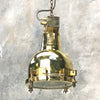 Vintage brass searchlight converted into an industrial style ceiling lamp