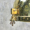 Vintage brass searchlight converted into an industrial style ceiling lamp