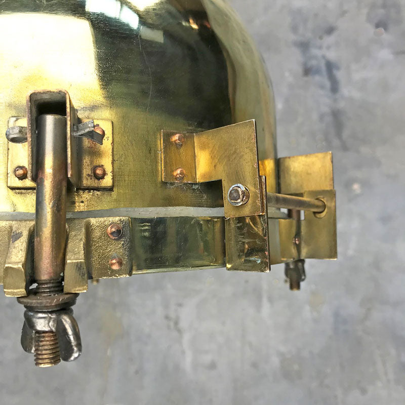 Vintage brass searchlight converted into an industrial style ceiling lamp