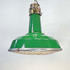A green enamel rustic ceiling light with bronze top section and metal cage made in England by Thorlux circa 1940.