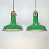 A green enamel rustic ceiling light with bronze top section and metal cage made in England by Thorlux circa 1940.