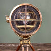 Shop the brass daylight signal lamp. A morse code light reclaimed from Navy ships. Paired with a Stanley of London tripod to create a bespoke signal light tripod floor lamp.