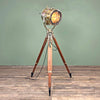 Shop the brass daylight signal lamp. A morse code light reclaimed from Navy ships. Paired with a Stanley of London tripod to create a bespoke signal light tripod floor lamp.