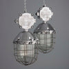 Two vintage industrial extra large cage ceiling lights by Polam wilkasy. Made in poland and restored in UK by skinflint sold by Loomlight