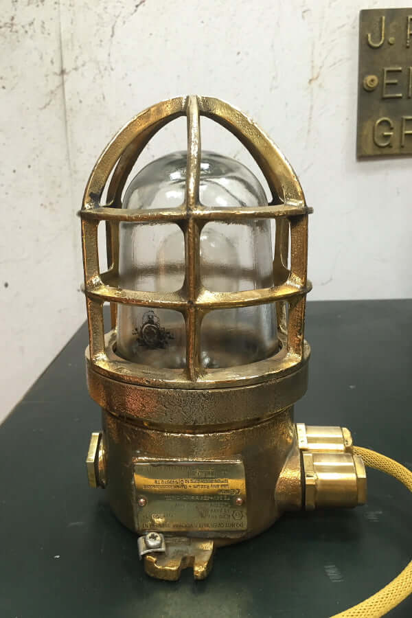 Reclaimed industrial brass cage table lamp with filament bulb