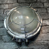 A retro industrial caged aluminium bulkhead wall light with frosted glass and protective cage.