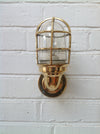 Reclaimed retro industrial style brass cage lighting for the wall