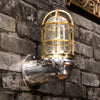 Aluminium and brass 90 degree wall lighting fixture.