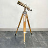 Vintage Nikon 15x80 4 degree naval binoculars finished with bronze veneer and wooden tripod.