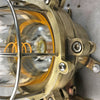A retro industrial cast brass explosion proof bulkhead wall light made c1970.