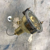 A reclaimed retro industrial cast brass directional outdoor wall washer light.