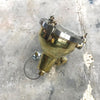 A reclaimed retro industrial cast brass directional outdoor wall washer light.