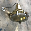 A reclaimed retro industrial cast brass directional outdoor wall washer light.