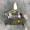 A reclaimed retro industrial cast brass directional outdoor wall washer light.