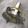 A reclaimed retro industrial cast brass directional outdoor wall washer light.