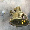 A vintage industrial brass directional wall light made in Japan