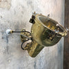 A vintage industrial brass directional wall light made in Japan