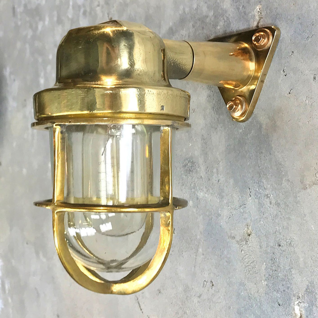 Shop our vintage outdoor light, professionally restored. An industrial style brass outdoor wall light compatible with LED light bulbs. With protective brass cage.