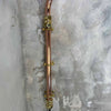 A vintage industrial style copper swing arm wall light with brass explosion proof pendant light.