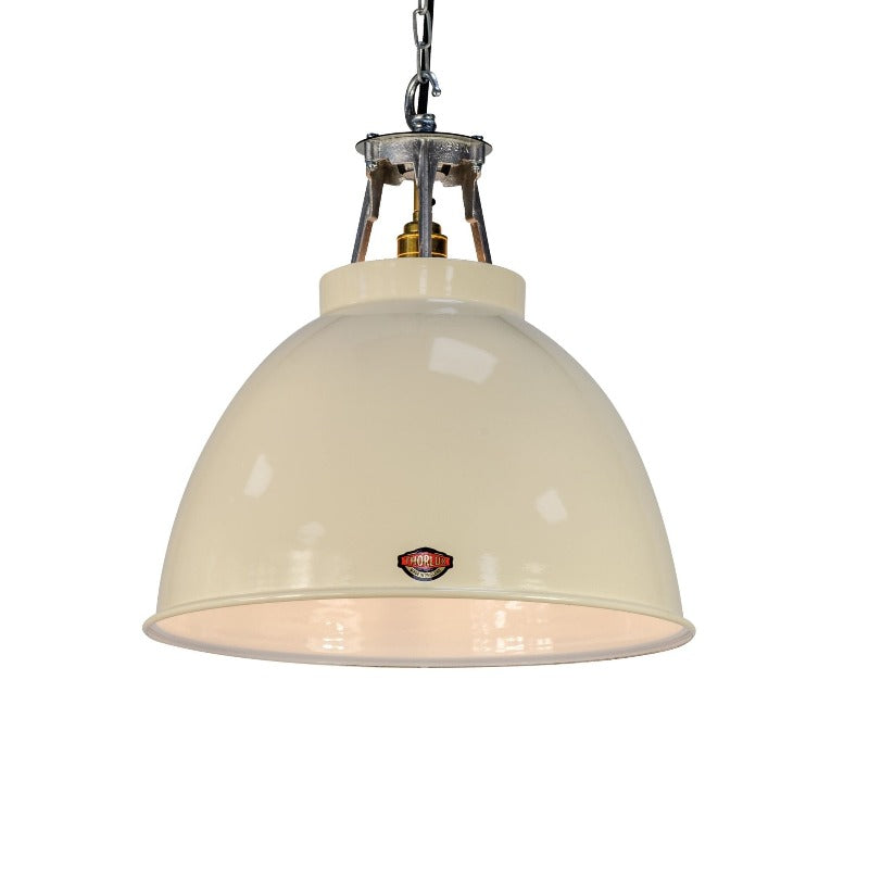 A vintage factory light ideal as farmhouse lighting. The ivory enamel ceiling light made by Thorlux is based on the original 1930's design of factory lighting. 
