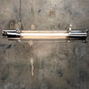 A vintage industrial aluminium flameproof ceiling strip light fitted with T8 LED tubes.