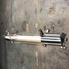 A vintage industrial aluminium flameproof ceiling strip light fitted with T8 LED tubes.
