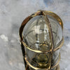 Vintage industrial cast brass 90 degree wall cage light by Industria Rotterdam.