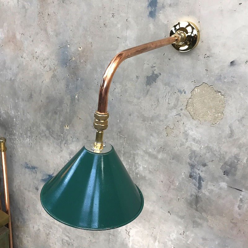 Vintage British army tilting festoon green lamp shade fitted to a bespoke copper and brass cantilever wall fitting. 