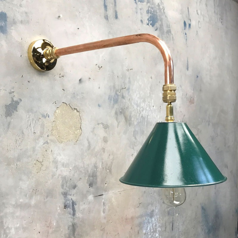 Vintage British army tilting festoon green lamp shade fitted to a bespoke copper and brass cantilever wall fitting. 
