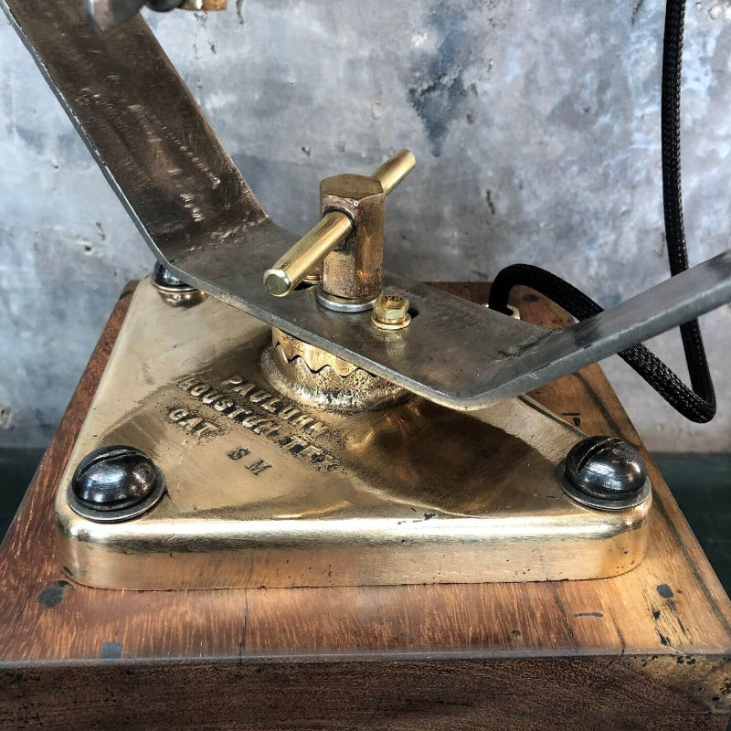 A unique vintage bronze and teak industrial desk lamp. 