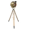 A tall nautical brass and steel searchlight mounted onto a British antique wooden surveyors tripod. A unique and original tall tripod floorlamp perfect for creating the "wow" factor with a nautical style fixture.