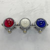 An original industrial cast aluminium, brass and red, white & blue glass micro spot trio wall light fixture.