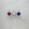 An original industrial cast aluminium, brass and red, white & blue glass micro spot trio wall light fixture.