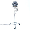 Retro industrial aluminium explosion proof cargo light with a telescopic Matthews theatre stand to create a large bespoke floor standing lamp.