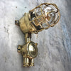 A vintage industrial Wiska industrial brass wall light with a protective brass wire cage & junction box.