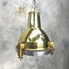 A small reclaimed vintage industrial brass spot light ceiling pendant