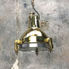 A compact reclaimed vintage industrial brass spot light ceiling pendant