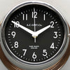 A non-ticking copper circular wall clock with black face, reclaimed and restored by AC.GMT.Co.