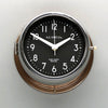 A non-ticking copper circular wall clock with black face, reclaimed and restored by AC.GMT.Co.