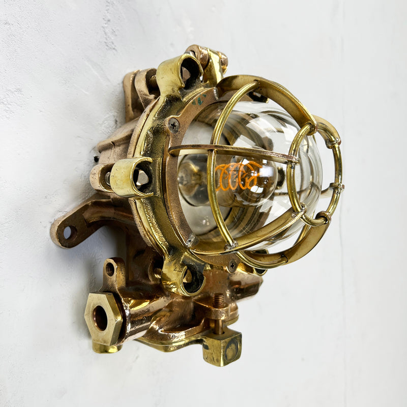 Vintage industrial bronze and brass flameproof wall cage light manufactured by Morio Denki 