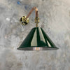 Shop an industrial style directional green wall light with copper arm fixture. The design is based on the military festoon shades. The conical green shade is attached to a 360 degree ball connector joint which means the shade is directional.