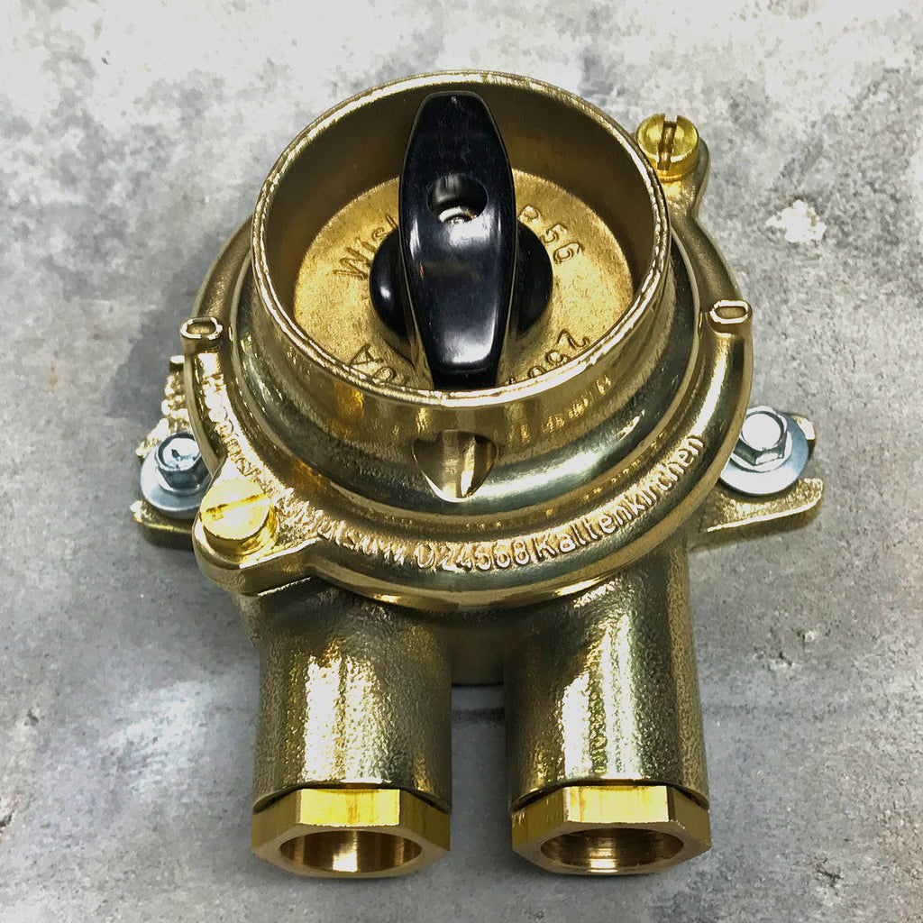 A vintage industrial surface mounted brass light switch by Wiska with 2 entry ports. This is a water tight light switch for indoor or outdoor use.