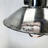Vintage industrial cage ceiling light made from cast steel with LED filament light bulb. professionally refurbished by British lighting restoration specialists Loomlight.