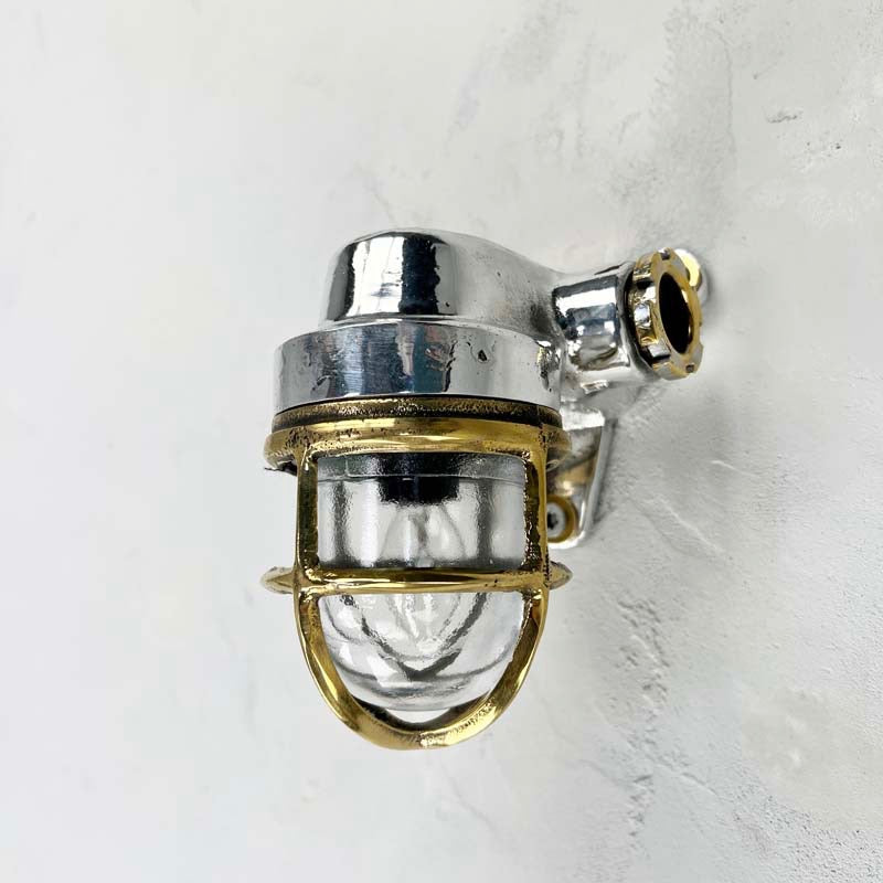 Shop our small industrial wall lights made from aluminium with a brass cage which can be mounted up or down to suit. Compatible with LED bulbs. 